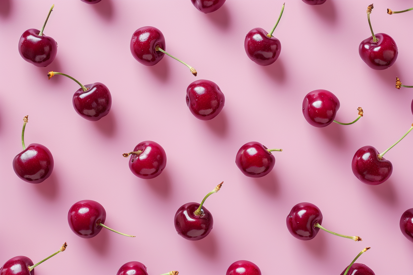 Image gratuite Tranches de cerises sur fond rose pastel 4